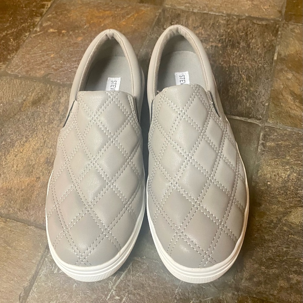 Steve Madden quilted slip-on shoes.